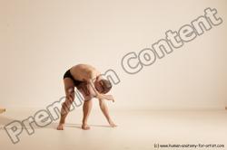 Underwear Gymnastic poses Man White Slim Bald Brown Dancing Dynamic poses Academic